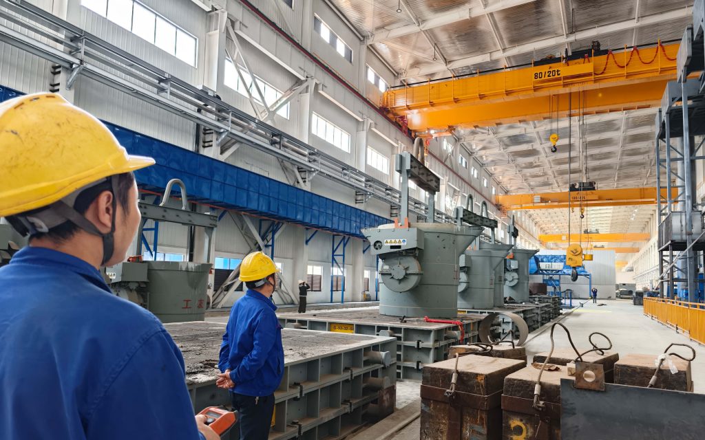 Heavy duty crane operation for manufacturing plant material handling
